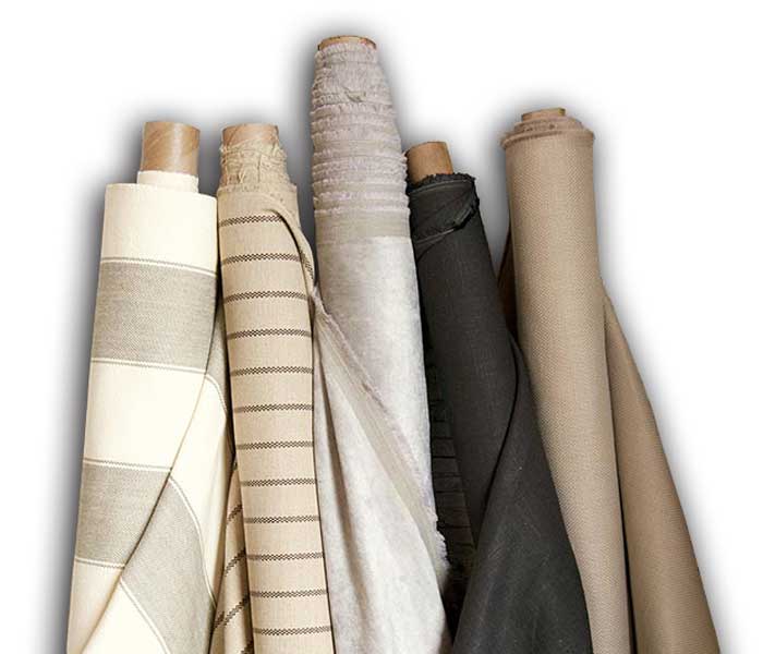 photo of rolls of fabric in shades of brown, photo courtesy Fabricut